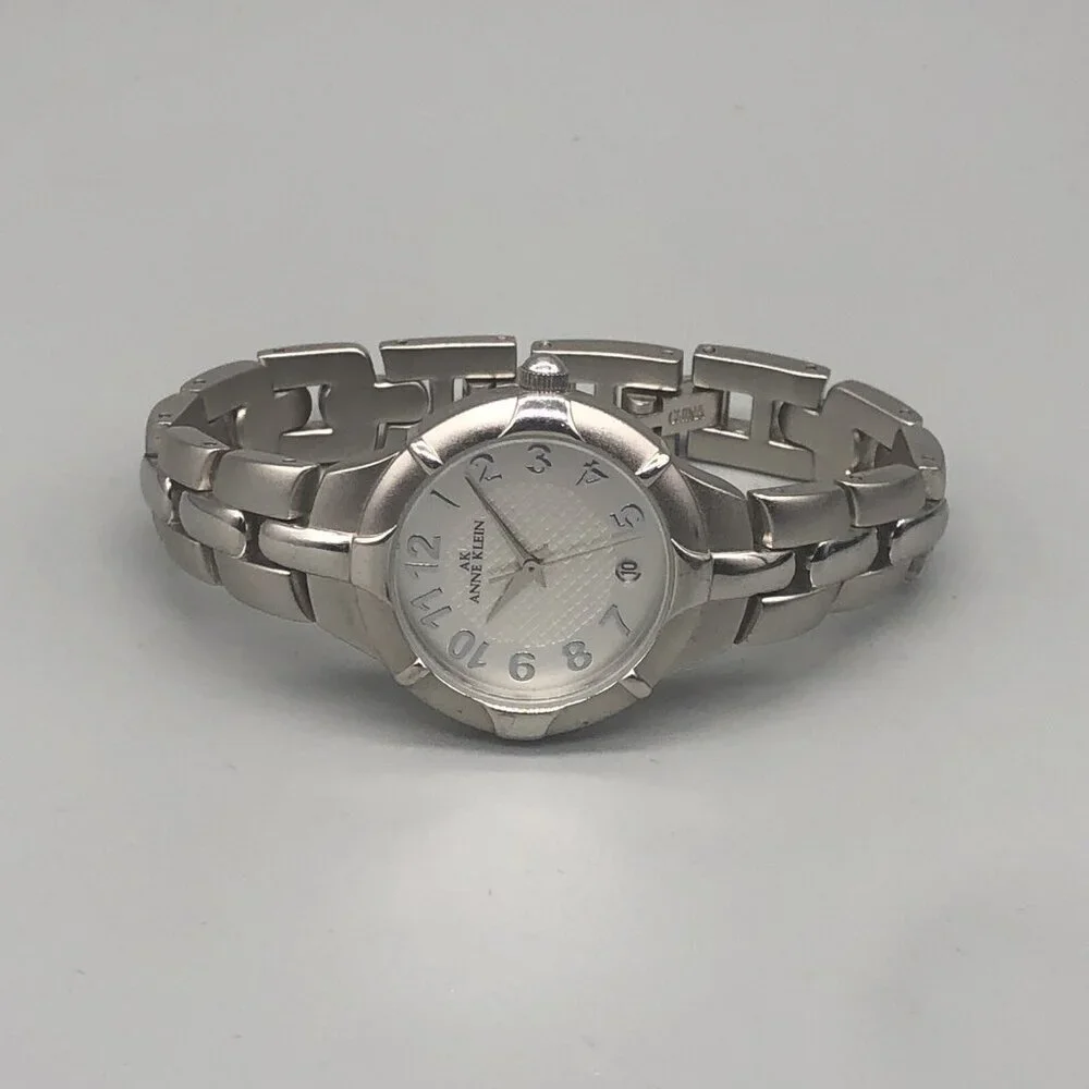 3/$30 Anne Klein Watch Women Silver Tone Round Dial 27MM Date Window New Battery